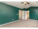 Bedroom with high ceilings, and a connecting bathroom at 1720 Forest Side Ln, Charlotte, NC 28213
