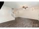 Open living area showcases hardwood floors, neutral walls, and staircase access at 1720 Forest Side Ln, Charlotte, NC 28213