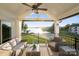 Cozy outdoor balcony seating with stunning sunset and lake views at 17810 Half Moon Ln # L, Cornelius, NC 28031