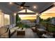 Comfortable balcony seating with an evening sky and views of the lake at 17810 Half Moon Ln # L, Cornelius, NC 28031