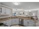 Kitchen view with stainless steel dishwasher and other appliances at 17810 Half Moon Ln # L, Cornelius, NC 28031