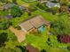 Aerial view of a home with a sprawling green lawn, mature trees, and manicured landscaping at 189 Billy Jo Rd, Mooresville, NC 28117