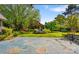 Landscaped backyard featuring a fountain at 189 Billy Jo Rd, Mooresville, NC 28117