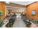 Unique foyer features a bridge over a pond, wood paneled walls and beamed ceilings at 189 Billy Jo Rd, Mooresville, NC 28117