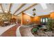 Spacious foyer with stone flooring, a bridge over a pond and beamed ceilings at 189 Billy Jo Rd, Mooresville, NC 28117