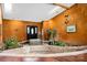 Unique entry with a bridge over an indoor pond, stone floors and bright lighting at 189 Billy Jo Rd, Mooresville, NC 28117