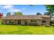 Charming ranch-style brick home with manicured lawn and mature landscaping at 189 Billy Jo Rd, Mooresville, NC 28117