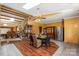 An open kitchen and dining area features wood cabinets, stainless appliances, and bright natural light at 189 Billy Jo Rd, Mooresville, NC 28117