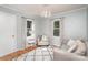 Cozy living room with hardwood floors, area rug and natural light at 204 Myers St, Fort Mill, SC 29715