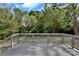 View of the back deck, showing the lush and private backyard at 205 Mcgregor Rd, Gastonia, NC 28056
