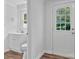Clean, modern bathroom featuring a door to the exterior at 205 Mcgregor Rd, Gastonia, NC 28056