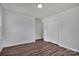 Bedroom features luxury vinyl flooring, and a closet, and access to a different room in the house at 205 Mcgregor Rd, Gastonia, NC 28056