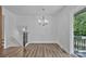 Dining room featuring new floors, a large window, and neutral paint at 205 Mcgregor Rd, Gastonia, NC 28056