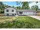 Charming two-story home features a large yard, attached garage and neutral colors at 205 Mcgregor Rd, Gastonia, NC 28056