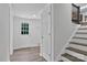 Hallway with staircase and exterior door, offering convenient access at 205 Mcgregor Rd, Gastonia, NC 28056