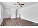 Bright living room featuring new floors, stairs, neutral paint and ceiling fan at 205 Mcgregor Rd, Gastonia, NC 28056