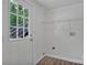Mud room featuring hardwood floor and a door to the rear deck at 205 Mcgregor Rd, Gastonia, NC 28056