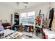 Bright art studio with natural light from large windows and paint supplies on the tables at 2110 Cool Springs Ct, Kannapolis, NC 28083