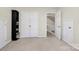 Bedroom features a neutral wall and carpet, with three different entry door options at 2110 Cool Springs Ct, Kannapolis, NC 28083