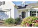 Welcoming front entrance with well-kept landscaping, close to the 2-car garage, and a sleek black front door at 2110 Cool Springs Ct, Kannapolis, NC 28083