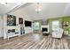 Spacious living room with vaulted ceilings, a fireplace, and large windows providing ample natural light at 2110 Cool Springs Ct, Kannapolis, NC 28083