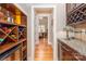 Convenient butler's pantry with built-in wine storage and granite countertops at 2153 Darian Way, Waxhaw, NC 28173
