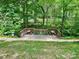 Scenic picnic area features wooden deck, tables, and lush greenery at 3100 Ventosa Dr, Charlotte, NC 28205