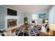 Comfortable living room with fireplace, hardwood floors, and plenty of natural light at 3340 Wrenwood Dr, Newton, NC 28658