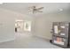 Spacious living room with stylish light gray vinyl floors that transition into the kitchen at 406 W Marion St, Kershaw, SC 29067