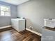 Laundry room with appliances and a window for natural light, offering a practical space at 485 Hilltop Rd, Oakboro, NC 28129