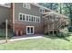 Backyard view showing patio, stair access to deck, and home exterior at 512 Saint Cloud Dr, Statesville, NC 28625
