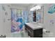 Charming bathroom featuring double sinks and whimsical mermaid-themed decor at 512 Saint Cloud Dr, Statesville, NC 28625