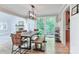 Bright dining area with a view to backyard and access to the kitchen at 512 Saint Cloud Dr, Statesville, NC 28625