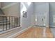 Grand foyer featuring hardwood floors, high ceilings, and staircase at 512 Saint Cloud Dr, Statesville, NC 28625