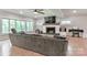Inviting living room with a fireplace and large windows at 512 Saint Cloud Dr, Statesville, NC 28625