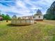 Above-ground pool in a sunny, private backyard at 5318 Austin Rd, Monroe, NC 28112