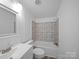 Clean bathroom featuring a vanity and tub with tiled walls for a functional and appealing space at 5318 Austin Rd, Monroe, NC 28112