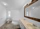 Bathroom with double vanity, tub, shower, and bright natural light at 5318 Austin Rd, Monroe, NC 28112