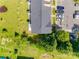 Aerial view of townhomes with green grass, parking, and landscaping at 542 Goldstaff Ln, Charlotte, NC 28273