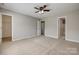 Open bedroom with multiple doors and neutral colors at 542 Goldstaff Ln, Charlotte, NC 28273