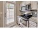 Kitchen featuring stainless steel appliances and granite countertops at 542 Goldstaff Ln, Charlotte, NC 28273