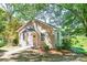 Charming home with neutral siding, an inviting entrance, and well-maintained landscaping at 602 Childs St, Lincolnton, NC 28092