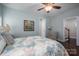 Bright bedroom with hardwood floors, neutral walls, and a ceiling fan at 6029 Bountiful St, Belmont, NC 28012