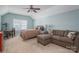 Cozy bedroom with vaulted ceilings, a ceiling fan, a comfortable sitting area, and a window for natural light at 6029 Bountiful St, Belmont, NC 28012