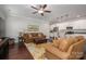 Cozy living room featuring hardwood floors and an open layout that flows into the kitchen and dining area at 6029 Bountiful St, Belmont, NC 28012