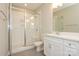Bathroom featuring a glass shower enclosure and a single sink vanity with neutral walls at 604 Tudor Park Way, Charlotte, NC 28211