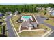 Aerial view of the community pool, clubhouse, playground, and parking area at 6159 Holland St, Fort Mill, SC 29707