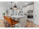 Stylish kitchen showcases a center island with seating, sleek appliances, and ample cabinet space at 6159 Holland St, Fort Mill, SC 29707