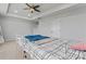 Large bedroom includes carpet flooring, tray ceiling and a ceiling fan at 6159 Holland St, Fort Mill, SC 29707