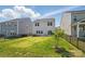 Spacious backyard with a well-maintained lawn, creating an inviting outdoor space for relaxation and recreation at 637 Scotch Meadows Loop, Monroe, NC 28110